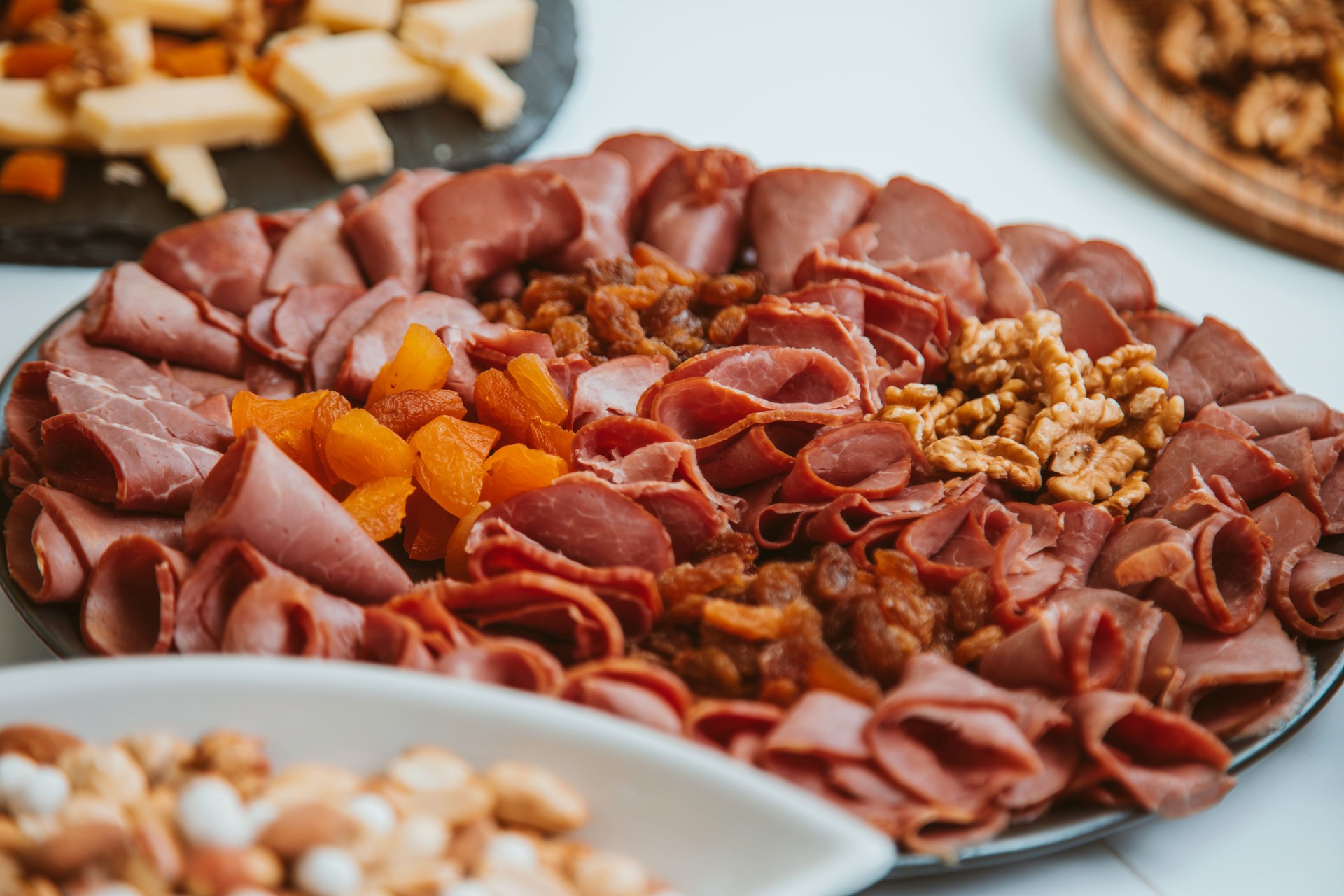 Gourmet Charcuterie Platter with Dried Fruits and Nuts